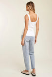 Back view of white ribbed tank top with side ruched detail