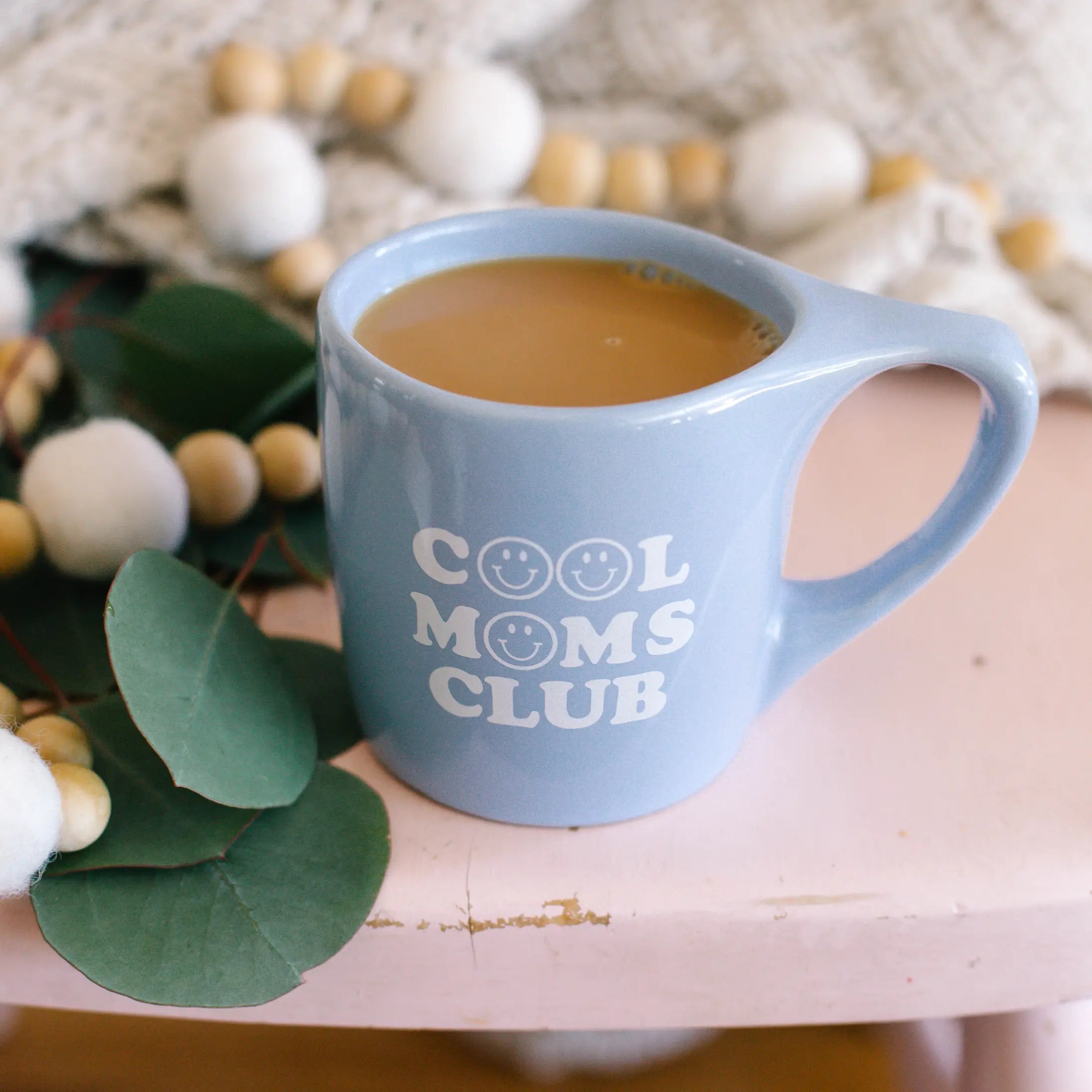 Cool Moms Club Ceramic Mug in Pastel Blue with Smiley Face from Rachel Allene